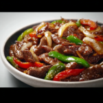 Sizzling Chinese Pepper Steak with Onions: A Flavorful CookTune Recipe