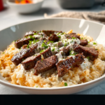 Creamy Queso Rice with Juicy Steak Strips